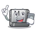 With phone button M on a keyboard mascot Royalty Free Stock Photo