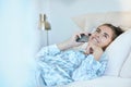 Phone call, bedroom and woman talking in home in the morning after waking up. Smile, mobile and happy female in bed Royalty Free Stock Photo