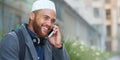 Phone call, city and smile, islamic businessman talking on cell outside office, happy worker in Turkey. Technology Royalty Free Stock Photo