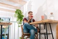 Handsome entrepreneur having important phone call with business partner Royalty Free Stock Photo