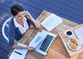 Phone call, laptop and businesswoman with breakfast on hotel deck with networking, documents and stats. Remote work Royalty Free Stock Photo