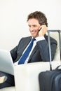 Phone call, laptop and man with mobile in airport for business trip, communication or schedule. Lobby, luggage and male Royalty Free Stock Photo