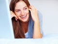 Phone call, laptop and woman on bed with smile, networking and communication in home. Wake up, relax and happy girl with Royalty Free Stock Photo