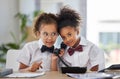 Phone call, office and children dressed as employees for play time, acting and pretending. Happy, business and girl kids Royalty Free Stock Photo