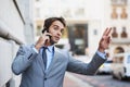 Phone call, street in city and taxi with businessman hailing ride outdoor for travel, transport or commute. Mobile Royalty Free Stock Photo