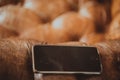 phone in a case lies on a leather chair Royalty Free Stock Photo