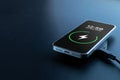 Phone charge. Mobile cell phone charge battery from wireless smart charger. Modern technology, portable fast charger. Royalty Free Stock Photo