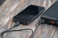 Phone and charging devices, power storage and charging cable Royalty Free Stock Photo