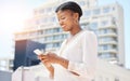 Phone, city and commute with a business black woman typing a text message while walking to work outdoor. Mobile, social Royalty Free Stock Photo