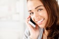 Phone, communication and networking with beauty, face and smile of a young woman talking on a call in her home. Skincare Royalty Free Stock Photo