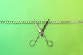 Phone cord being cut by scissors Royalty Free Stock Photo