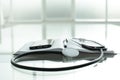 Phone diary pen medical stethoscope on glass table Royalty Free Stock Photo