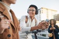 Phone, electric scooter and transport with a black man in the city on his commute into work. Technology, street and