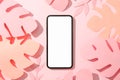 Phone with empty screen and decorative palm leaves on pink background