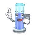 With phone graduated cylinder with on mascot liquid