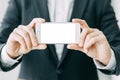 The phone in the hand of a business man Royalty Free Stock Photo