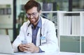 Phone, laptop and science with a man at work in a laboratory for research, innovation or development. Mobile, computer Royalty Free Stock Photo