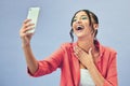 Phone, laughing selfie and woman with a meme on social media and funny joke for creative job in studio. Web influencer Royalty Free Stock Photo