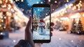 phone in man hand making photo of festive colorful Christmas tree and snowman in winter snowy city Royalty Free Stock Photo