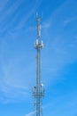 Phone mast against blue sky Royalty Free Stock Photo