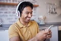 Phone, music and man on social media laughing at a funny joke on a podcast, network app or video streaming website Royalty Free Stock Photo