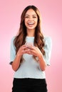 Phone, portrait and happy woman in studio online for communication, social media or app on pink background. Face