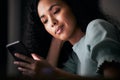 Phone, reading and professional woman at night typing, search online or contact social media user. Dark office Royalty Free Stock Photo