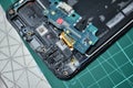 Phone repair, Smartphone damaged from dropping in sea water.