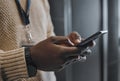 Phone, search or IT black man hands in data center for research, communication or typing in server room. Mobile, focus Royalty Free Stock Photo