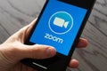 Phone showing Zoom Cloud Meetings app.