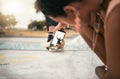 Phone, skate and photograph with a woman recording a man skater at the skatepark for fun or recreation. Mobile, skating Royalty Free Stock Photo