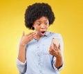 Phone, surprise and shock of black woman in studio isolated on a yellow background. Wow, cellphone and surprised African Royalty Free Stock Photo