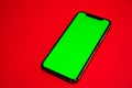 Phone XS, Phone smartphone, green screen on Red background