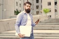 Phone you always desired. Bearded man use phone outdoors. Mobile phone messaging. SMS message. Cell phone. Smartphone Royalty Free Stock Photo