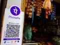 phonepe bar code payment gateway displayed on grocery store outside in India Dec 2019