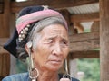 Phongsaly, Laos - november 2, 2019: portrait old woman wearing traditional turban belonging to minority ethnic group living in