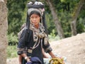 Phongsaly, Laos - november 2, 2019: portrait young Akha woman wearing traditional clothings belonging to minority ethnic group