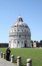 Phoning nun near Baptistry of St. John in Pisa