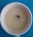 Phot of a cup of tea with milk