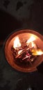 Phot of fire on the clay pot in winter sessions at our door photograph