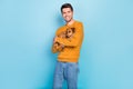 Phot of nice brunet guy hug dog wear brown shirt isolated on blue color background