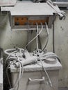 Photo of abandoned dusty powder coating machine in factory.