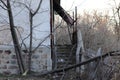 Abandoned stairs at the entrance of the old house