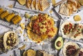 Photo above of a selection of many Mexican tapas, including tacos, guacamole, pico de gallo, nachos and others