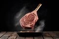 Photo An action packed shot capturing a flying Wagyu beef steak roast Royalty Free Stock Photo