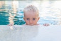 Photo of active baby in swimming pool Royalty Free Stock Photo