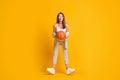 Photo of adorable attractive young woman hold game ball excited look ready play basketball wear singlet pants sneakers Royalty Free Stock Photo