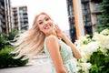 Photo of adorable charming lovely girl going store mall centre walking windy sunny warm weather outdoors Royalty Free Stock Photo