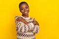 Photo of adorable cute lady girl pleased comfy cozy soft stylish knitwear jumper stand empty space isolated on yellow