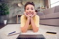 Photo of adorable cute student lady use netbook web camera hands cheeks wear yellow t-shirt in modern house indoors Royalty Free Stock Photo